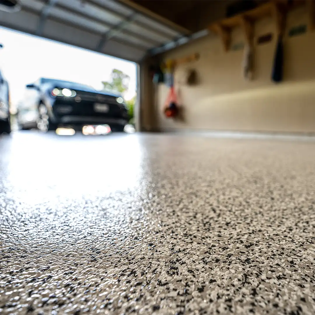 Decorative garage epoxy flooring with a flake finish in Northern Michigan